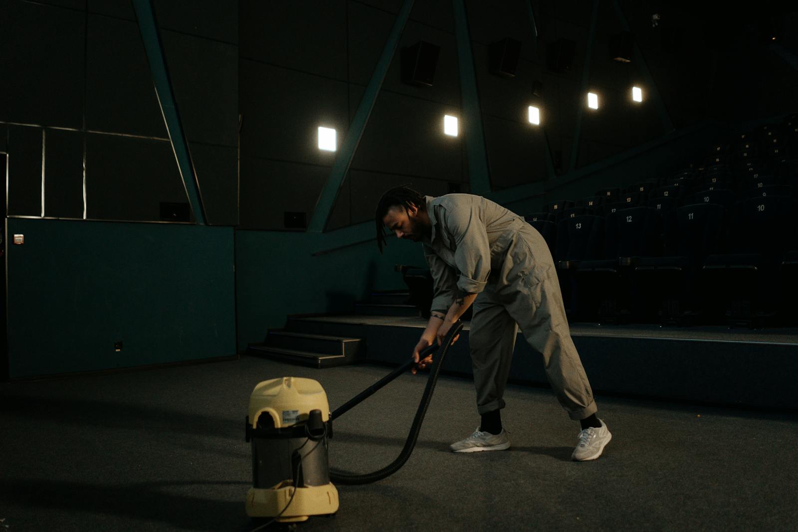 Coastal Facility Services technician servicing a commercial venue after hours